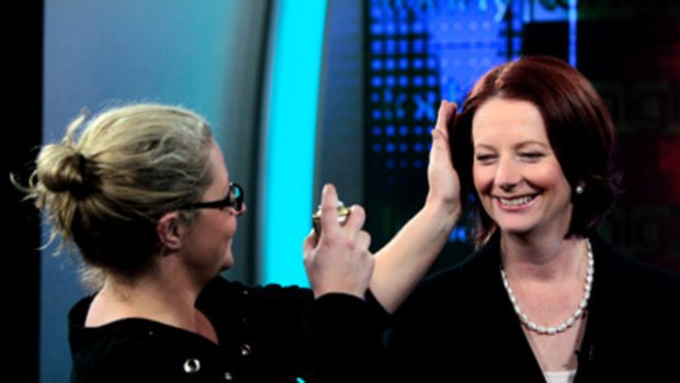 Julia Gillard gets a last-minute touch up before an interview at Channel Seven's Sydney studios.