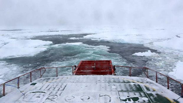 All white: A view from the stern of the Aurora Australis as it punches its way through sea ice.