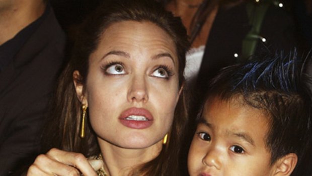 Mother and son at the movies ... Angelina Jolie and Maddox attend the world premiere of Shark Tale at the Venice Film Festival in 2004.