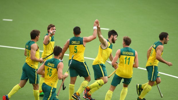 Chris Ciriello (5) celebrates with his teammates after scoring the team's second goal.