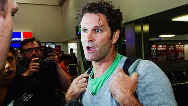 Chris Cairns arrives at Auckland Airport on Thursday, the day he was named as one of three players being investigated for fixing.