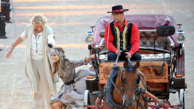 Big entrance ... Jennifer Lopez arrives for her interview in a horse drawn carriage.