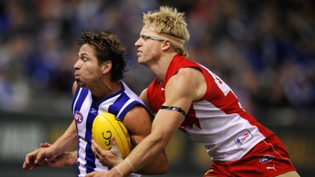 AFL football round 6, North Melbourne v Sydney at Telstra Dome.
Paul Bevan tackles Shannon Grant in 2008.