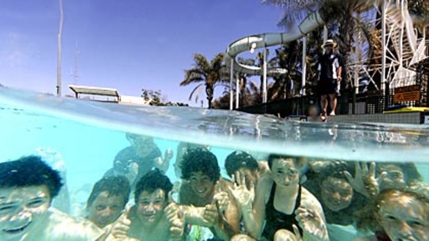 On reflection, year 8 students at MacKillop College, Swan Hill, find the November heat has its advantages as they cool at their local swimming pool.