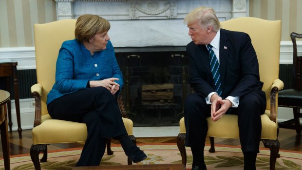 President Donald Trump meets with German Chancellor Angela Merkel in the Oval Office of the White House in Washington, Friday, March 17, 2017. 