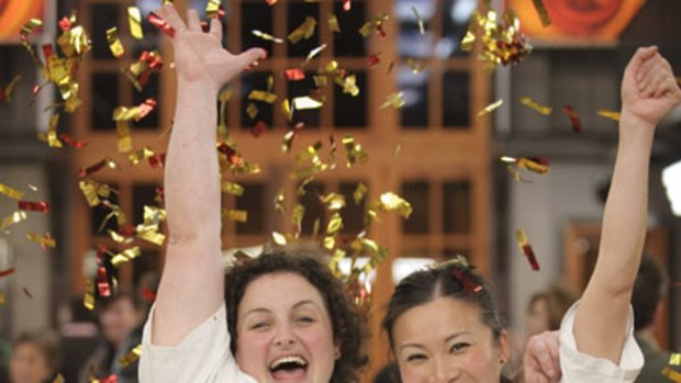 Julie Goodwin and Poh Ling Yeow celebrate during the MasterChef final.