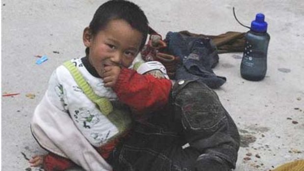 Kidnapped . . . Yang Weixin, 5, was found begging.