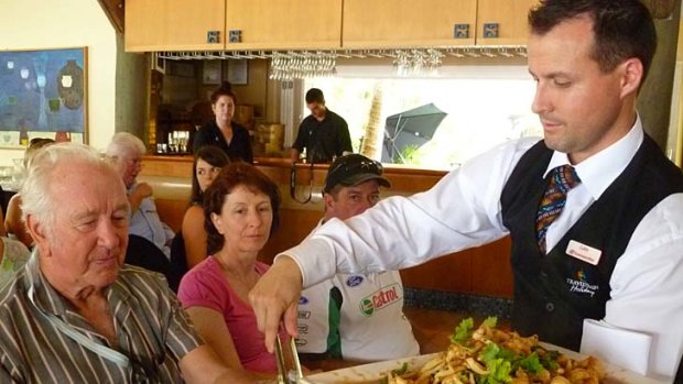 During a beachside cooking lesson, guests are treated to freshly cooked dishes using Queensland produce.