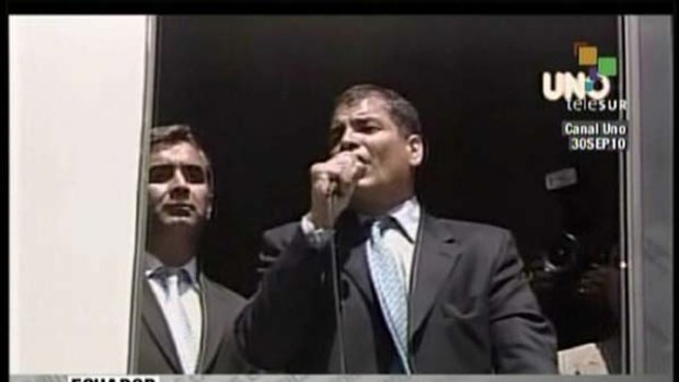 A TV grab shows Ecuador's President Rafael Correa giving a speech at the Army Regiment of Quito on September 30, 2010.