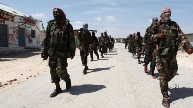 Targeted by US drone attack ... Al Shabaab soldiers patrol in a formation along the streets of Dayniile district in Southern Mogadishu in 2012.