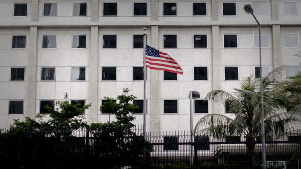 State secrets: As the flag fluttered in front of the US consulate in Hong Kong,  Edward Snowden leaked details of a US program to monitor internet users.