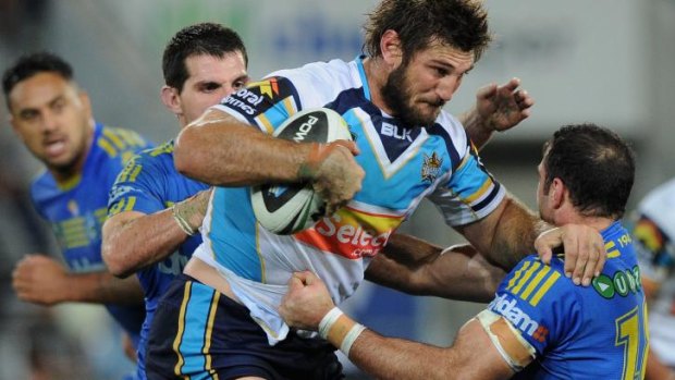 Runaway coal train: Dave Taylor has been playing in the centres for the Titans.