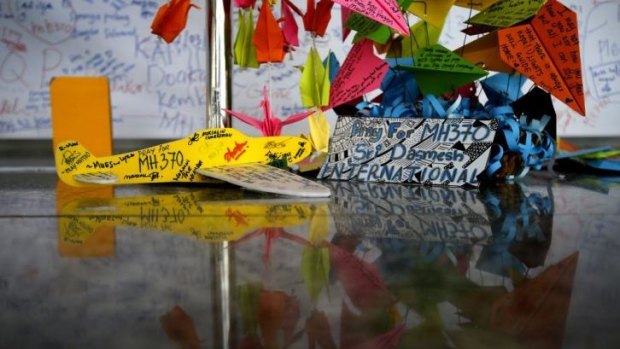 Messages dedicated to people on the missing plane at Kuala Lumpur International Airport.