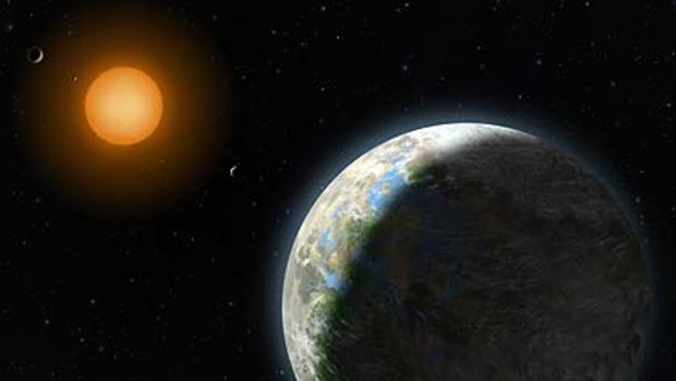 An artist's impression  from the National Science Foundation of the new planet, right,  in the "Goldilocks zone" _ just right for life. Not too hot, not too cold. Not too far from its sun, not too close. And it is near Earth _ relatively speaking, at 120 trillion miles.