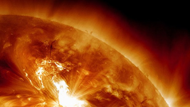 Another image shows the flare erupting on the sun's northeastern hemisphere.