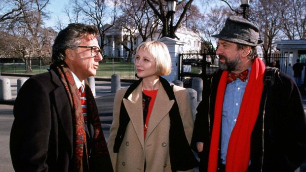 Dustin Hoffman, Anne Heche and Robert De Niro in a  scene from the Barry Levinson's Wag The Dog.