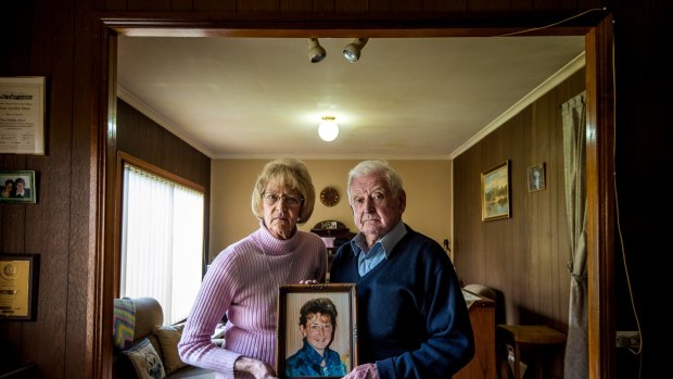 Ann and Spike Jones at home with a picture of their daughter Nina Nicholson.