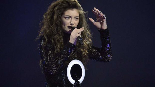 Singer Lorde accepts the international female solo artist award at the Brit Awards in London.