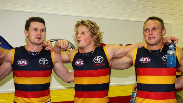 Jenkins, and the rest of the footy world, are hoping to see Crow star Rory Sloane (right) "butt heads" with his mate and fellow midfield force, Patrick Dangerfield.
