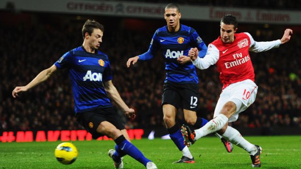 Robin van Persie (right) scores for Arsenal against Manchester United in January. The Dutchman is now set to join United.