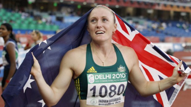 Pure relief ... Sally Pearson wins gold in the women's 100m hurdles.