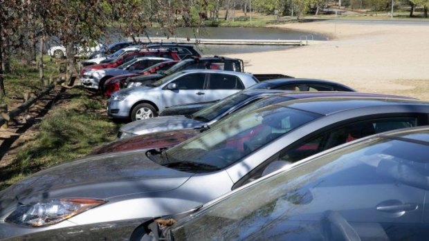 Cars parked near Lotus Bay in Yarralumla on the second day of pay parking in the Parliamentary triangle.