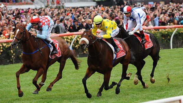 Take two: Dunaden (yellow colours) defeats Red Cadeaux in last year's Cup.