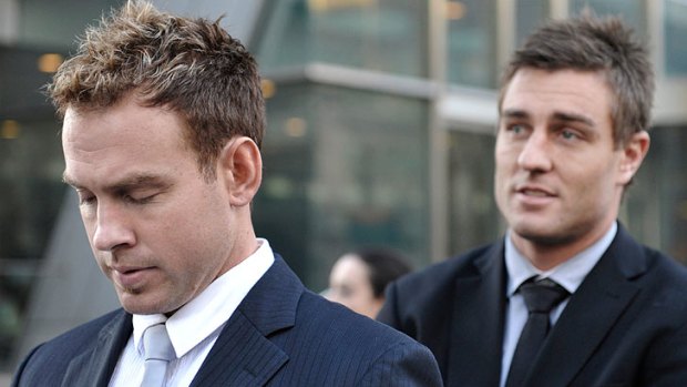 'Did you chop her?' ... Teammates Jason Gram and Sam Fisher leave court after giving evidence in the Lovett trial.