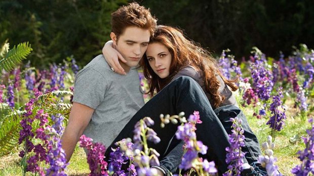 Robert Pattinson and Kristen Stewart as Edward and Bella.