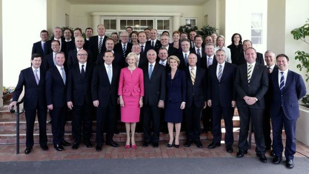 Comfortable in control: Tony Abbott and with his new ministry.