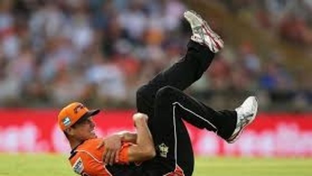 Coulter-Nile clutches his right shoulder after dislocating it while fielding for the Perth Scorchers in the Big Bash League back in 2015.