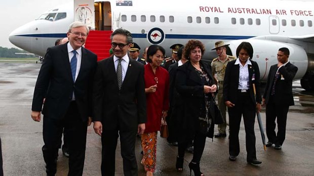 Prime Minister Kevin Rudd is greeted by Indonesian Foreign Minister Marty Natalegawa on his arrival in Jakarta.