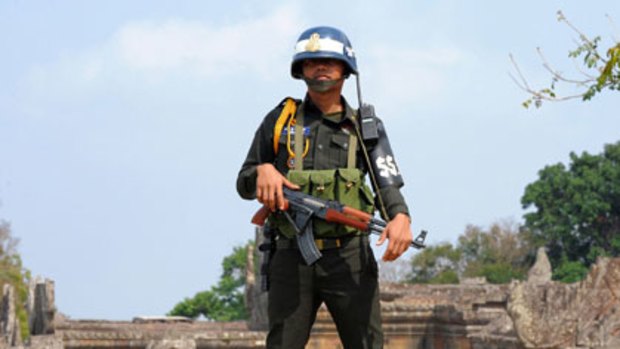Tense ... a Cambodian soldier guards Preah Vihear temple.