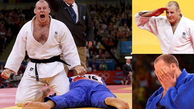 Torpedoed ... Australia’s Jake Andrewartha lies prone after being floored after 24 seconds by British Royal Marine Chris Sherrington in the judo competition