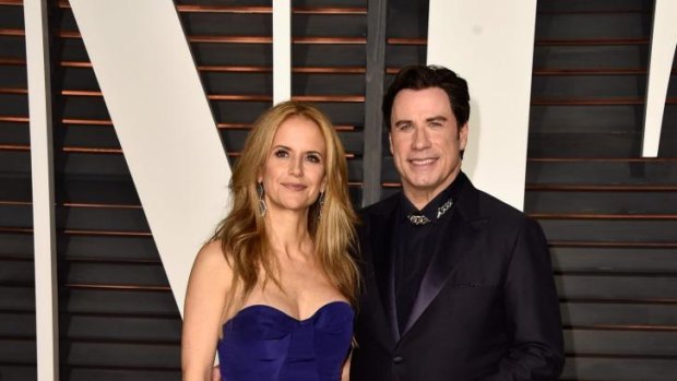John Travolta with his wife Kelly Preston at this year's <i>Vanity Fair</i> Oscar Party.