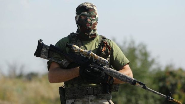 Pro-Russian rebel sniper 'Angel' on road outside Shakhtersk.