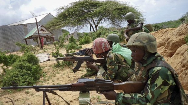 African Union peacekeepers take aim in Somalia's capital, Mogadishu.
