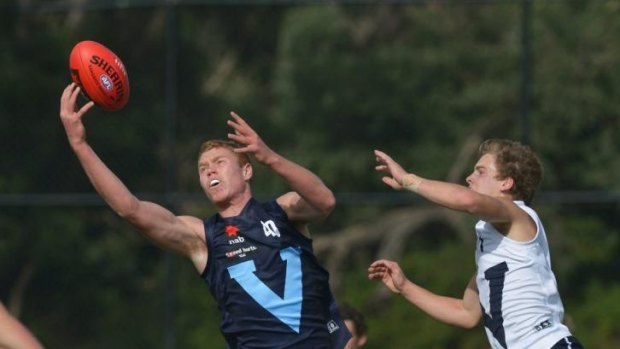 Potential number one pick Peter Wright (left) in action for Vic Metro in May.