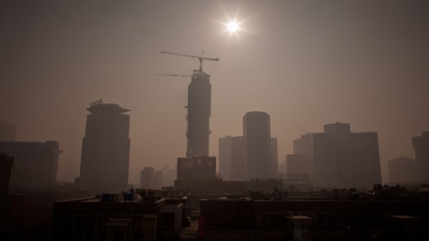 Highest levels since records began ... Severe pollution clouds the Beijing skyline on January 12.