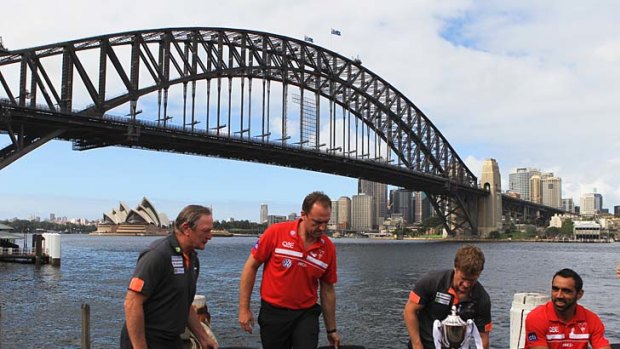 Harbour views: Kevin Sheedy and Luke Power with Sydney rivals Adam Goodes and John Longmire at the launch of the Sydney derby yesterday.