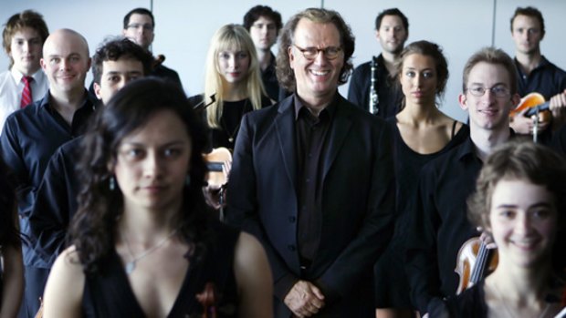 Support: Dutch violinist Andre Rieu with members of the Australian National Academy of Music. He has spoken out against funding cuts to the institution.