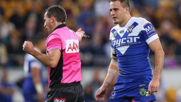 Season on the line: Referee Gerard Sutton sinbins Josh Reynolds for his contact with Ben Barba.