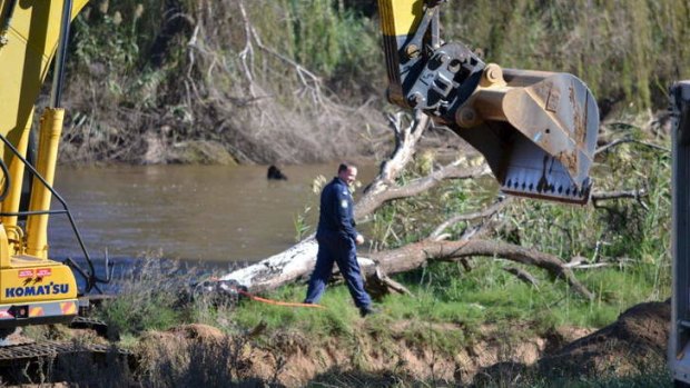 Police search the area south of Dubbo in April last year for the body of Lateesha Nolan.