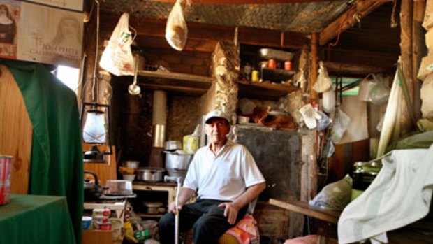 Bare necessities ... Mijo Matanovic, 76,  at his home in Old Nobby’s Camp. His home of 30 years is made of sandstone, corrugated iron, steel mesh and even cardboard.