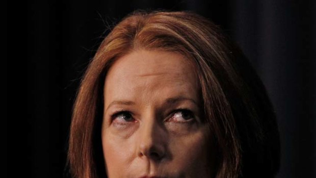 Blame game ... Julia Gillard at the news conference in Canberra.