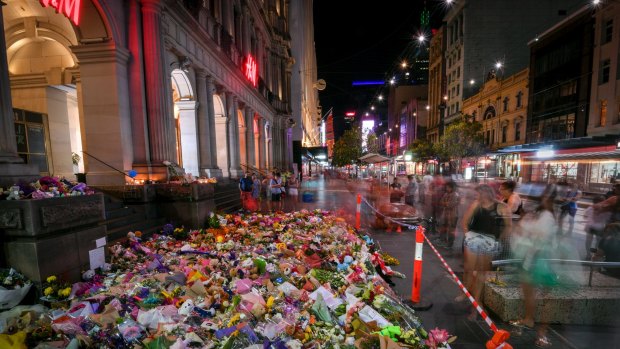 Floral tribute at Bourke Street Mall on Sunday night. 
