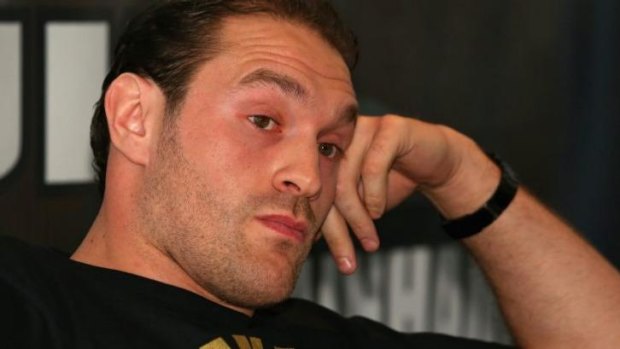 On the boil: Tyson Fury before his press conference flip-out