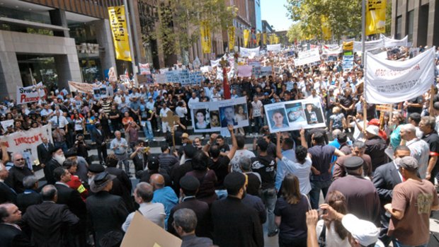 Members of Australia's Coptic Christian community march through Sydney to protest at the deaths of six Copts in Egypt.