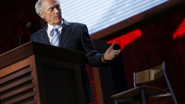 Actor Clint Eastwood addresses an empty chair and questions it as if it is US President Obama.