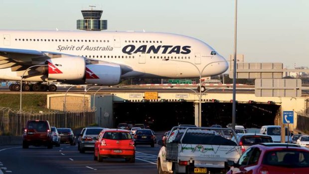 A Qantas A380 taxis along the runway at Sydney Airport.